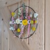 Flowerpowerring met fleurige droogbloemen