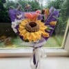 Gehaakte zonnebloem lily boeket
