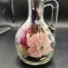 Glazen karafje incl. droogbloemen en een kurk
