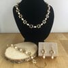 Herinnering & Hoop, Sieradenset van ketting, armband en oorbellen met Davidster en parels