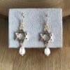 Herinnering & Hoop, Sieradenset van ketting, armband en oorbellen met Davidster en parels