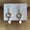 Herinnering & Hoop, Sieradenset van ketting, armband en oorbellen met Davidster en parels