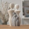 Modern 3d geprint beeldje gezin met 3 kinderen