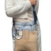 Schoudertas gemaakt uit oude vintage leren gaastra laarzen in de kleur beige.