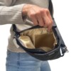 Stoere schoudertas gemaakt van denim g star spijkerbroek en zwart leer in het achterpand met gouden voering.