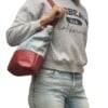 Stoere shopper gemaakt van recycled denim en rood leer