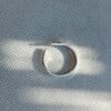 'Love is just a round the corner', open zilveren ring met hartje