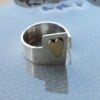 'Love is just a round the corner', open zilveren ring met hartje