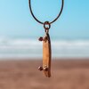 Oceaan Surfskateboard ketting goud