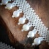 Asymmetrische boho ketting met schelp en parel – bruids- of strandaccessoire