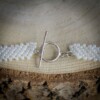 Asymmetrische boho ketting met schelp en parel – bruids- of strandaccessoire