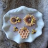 Bijen zonnebloem kaars in schaal