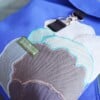 Blauwe waterdicht rugzak met magische paddestoel textiel kunstwerk