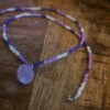 Gekleurde kralen ketting met bedel
