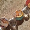 Gerecycelde ketting van papier en glaskralen