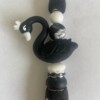 Kralenpen met zwart zwaantje