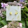Gele Lelietje-van-dalen Oorbellen – Microgehaakt met groene blaadjes