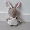 Herinneringshaasje van eerste babykleding
