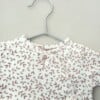 Herinneringshaasje van eerste babykleding