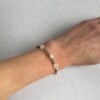 Kralenarmband met halfedelstenen in roze- en wittinten