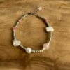 Kralenarmband met halfedelstenen in roze- en wittinten
