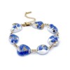 Armband met Steenvormige Hangers Gevuld met Echte Bloemen uit Den Haag (The Tide)