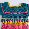 Gehaakt baby vestje | Petrol, roze en geel met roze franjes