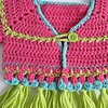Gehaakt baby vestje | Roze, turquoise en groen met groene franjes