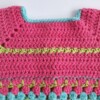 Gehaakt baby vestje | Roze, turquoise en groen met groene franjes