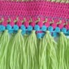 Gehaakt baby vestje | Roze, turquoise en groen met groene franjes