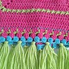 Gehaakt baby vestje | Roze, turquoise en groen met groene franjes