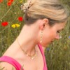 Kleurrijke Bedelketting met Bedels met Echte Bloemen uit Den Haag