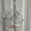 Suncatcher met maan en aquamarijn en delicate levensboom.