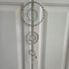 Suncatcher met turquoise en kleine schelpjes.