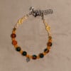 Armband herfst met facetkralen en zilverkleurig blaadje