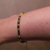 Armband van groene en gele rocailles met zilverkleurige sluiting