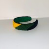 🧵 Punch Needle Haarband – Handgemaakt & Uniek in Rood, Geel, Groen en Zwart