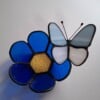 Glas in lood herdenkingslichtje met blauwe vlinder