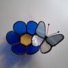 Glas in lood herdenkingslichtje met blauwe vlinder