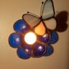 Glas in lood herdenkingslichtje met blauwe vlinder