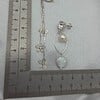 Asymmetrische oorbellen met Swarovski en zoetwater parels