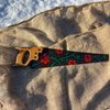 Handbeschilderde upcycled vintage metalen zaag met rode rozen