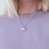 Ketting met roze en groene stegosaurus hanger