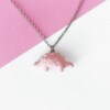 Ketting met roze en groene stegosaurus hanger
