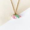 Ketting met roze met groene triceratops hanger