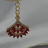 Luxe asymmetrische oorbellen goud en rood