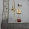 Luxe asymmetrische oorbellen goud en rood