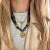 Stof ketting met panterprint en RVS bedel