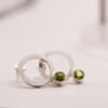 Zilveren oorbellen met peridot – IJseffect & sprankelende frisheid