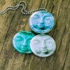 budha,buddha ketting,budha medaillon,budha gezicht,buddha face,Fotomedaillon ketting met drie verschillende verwisselbare voorkanten met foto`s van budha,Blauw grijze buddha gezichten. Voor het dicht bij je dragen van je favoriete foto.
